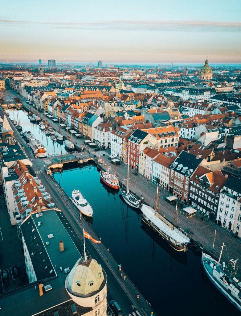 Aerial view of Nyhavn canal and central Copenhagen skyline
