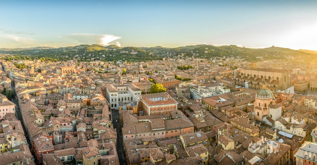 Bologna skyline with terracotta rooftops at sunset