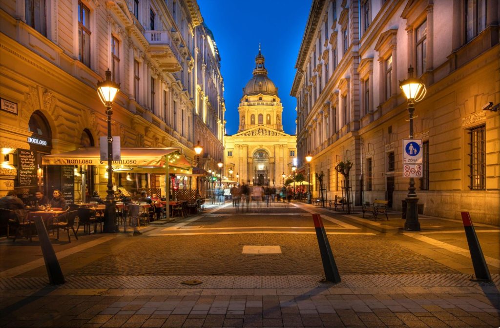 Evening street scene with Illuminated historic buildings