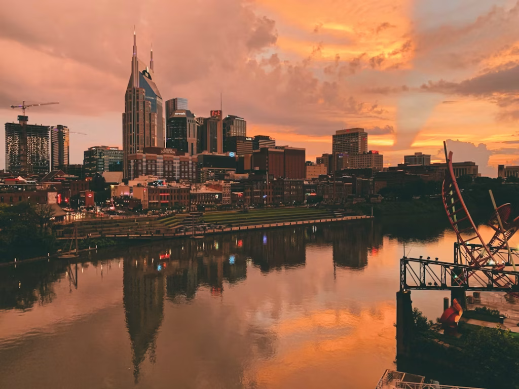 Nashville skyline reflected in Cumberland River at sunset