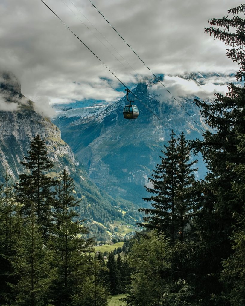 Cable car over Swiss alpine valley